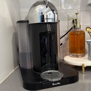 Nespresso Black and Silver Coffee Machine